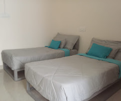 Luxury PG double sharing room in Adugodi Bangalore at NS Comfort